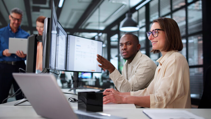 Finance team reviewing a digital invoice on screen